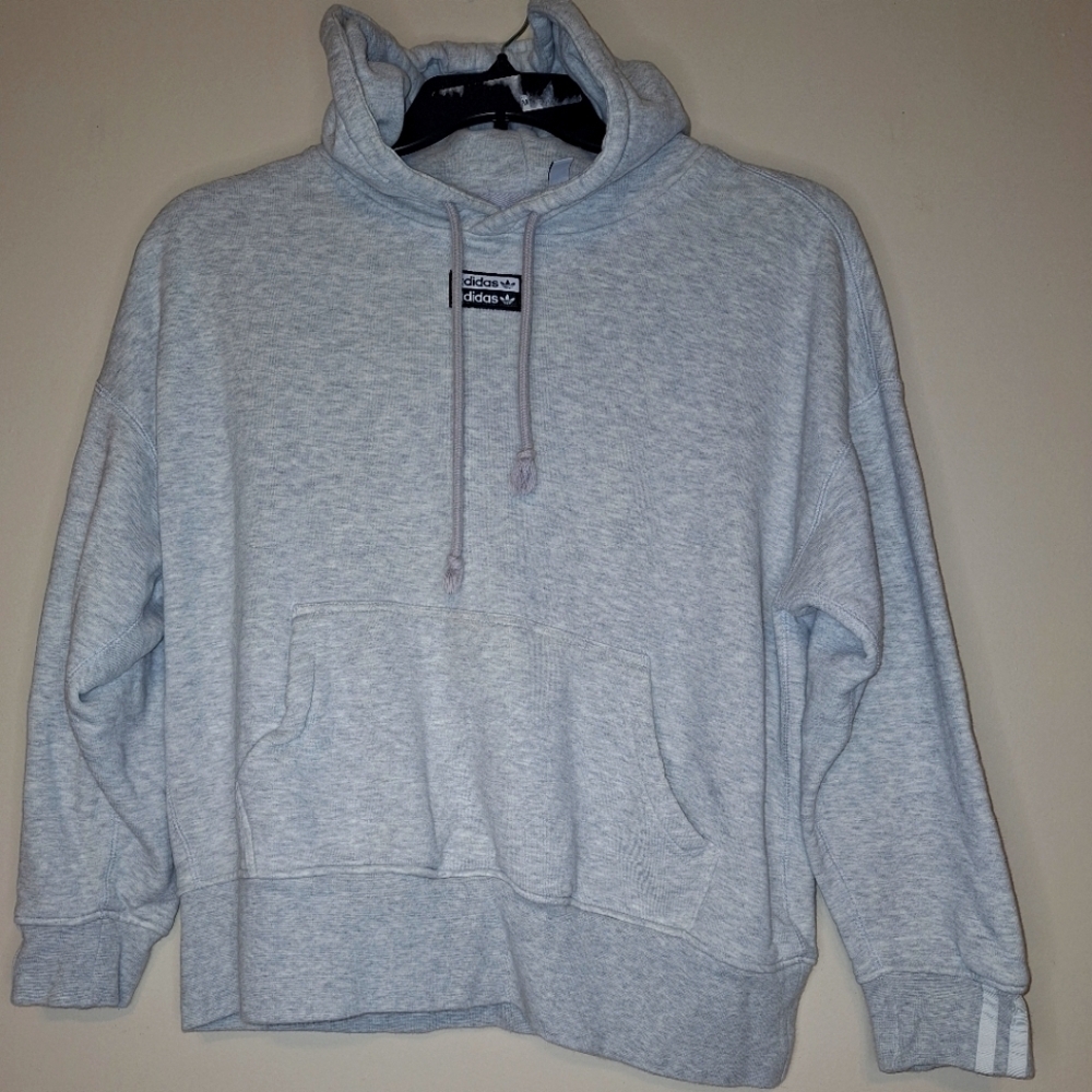 An Adidas hoodie in a mens size small. It's pre-loved and in great condition.